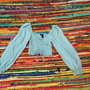 Long sleeve crop top.